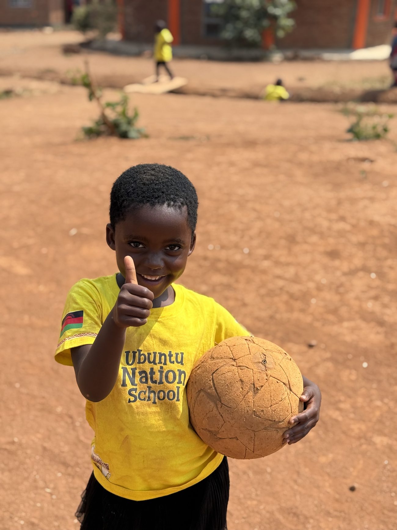 An Ubuntu Nation School student in the schoolyard