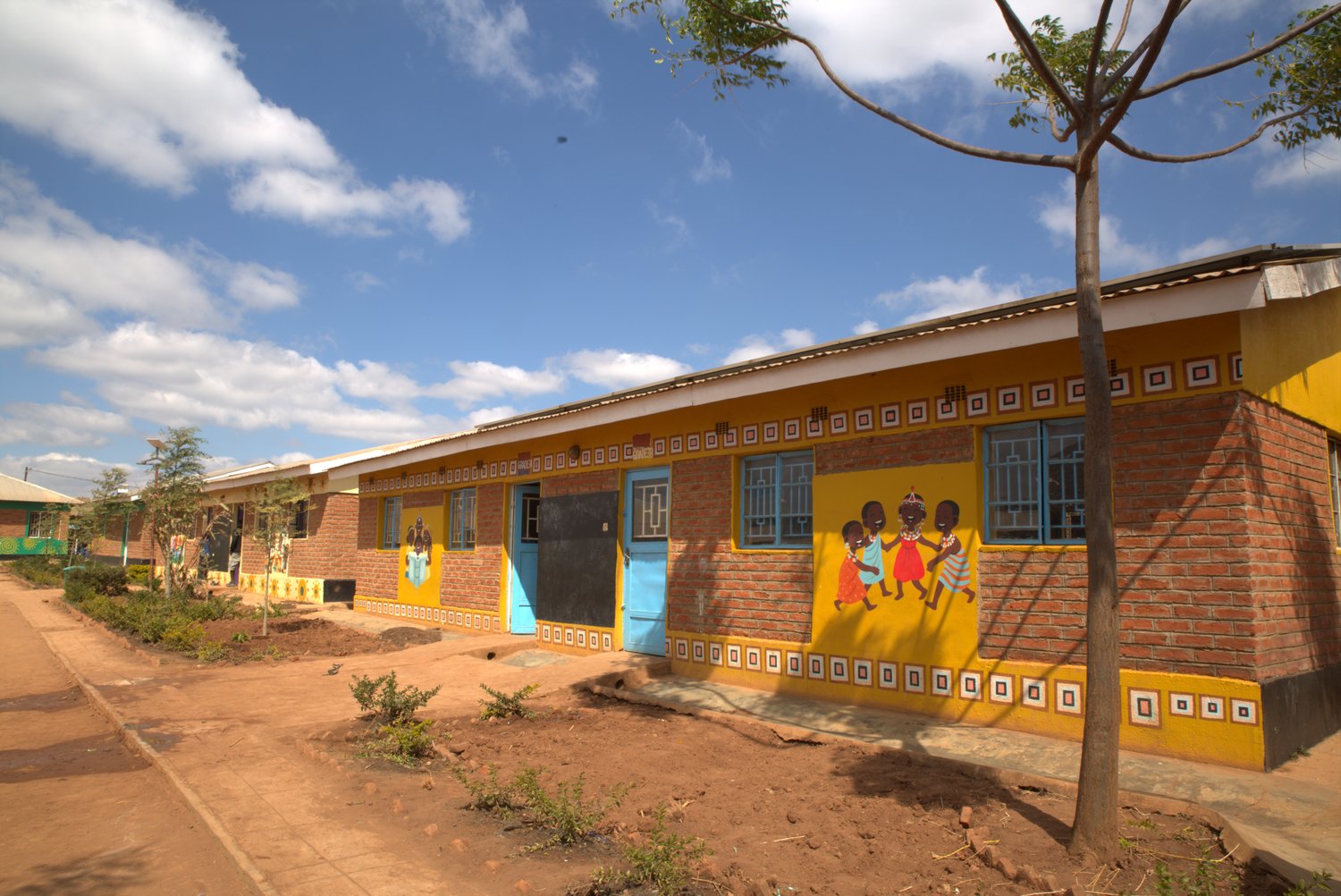 Ubuntu Nation School buildings with colourful murals in Dzaleka, Malawi